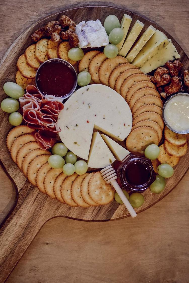 Grazing Tray with Cheese, Crackers, Grapes, Roasted Nuts and Prosciutto - Charcuterie Recipe