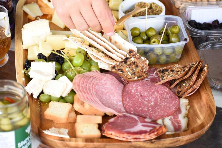 Charcuterie Cheese Board with Olives, Grapes, Salami and Crostini Recipe
