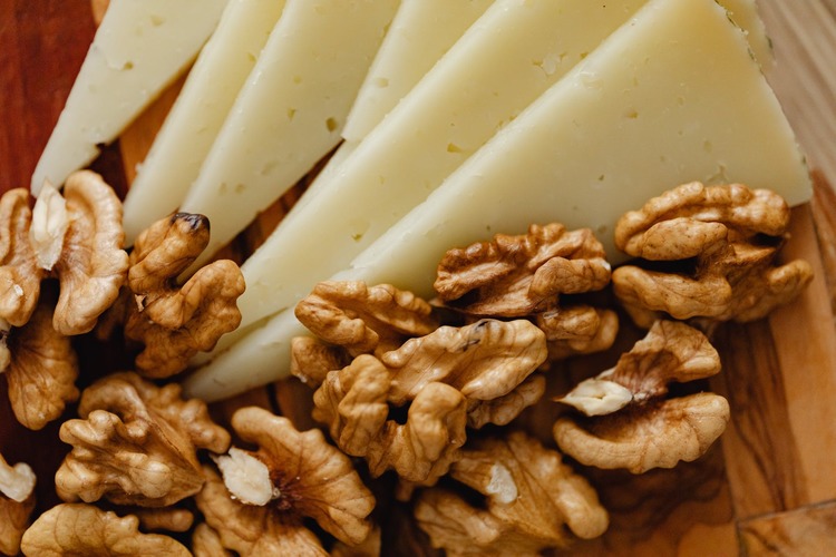 Sliced Cheese and Roasted Walnuts on a Charcuterie Board Recipe