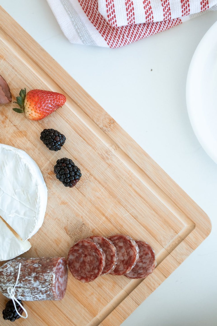 Charcuterie Board with Salami, Brie Cheese, Blackberries and Strawberries - Charcuterie Recipe