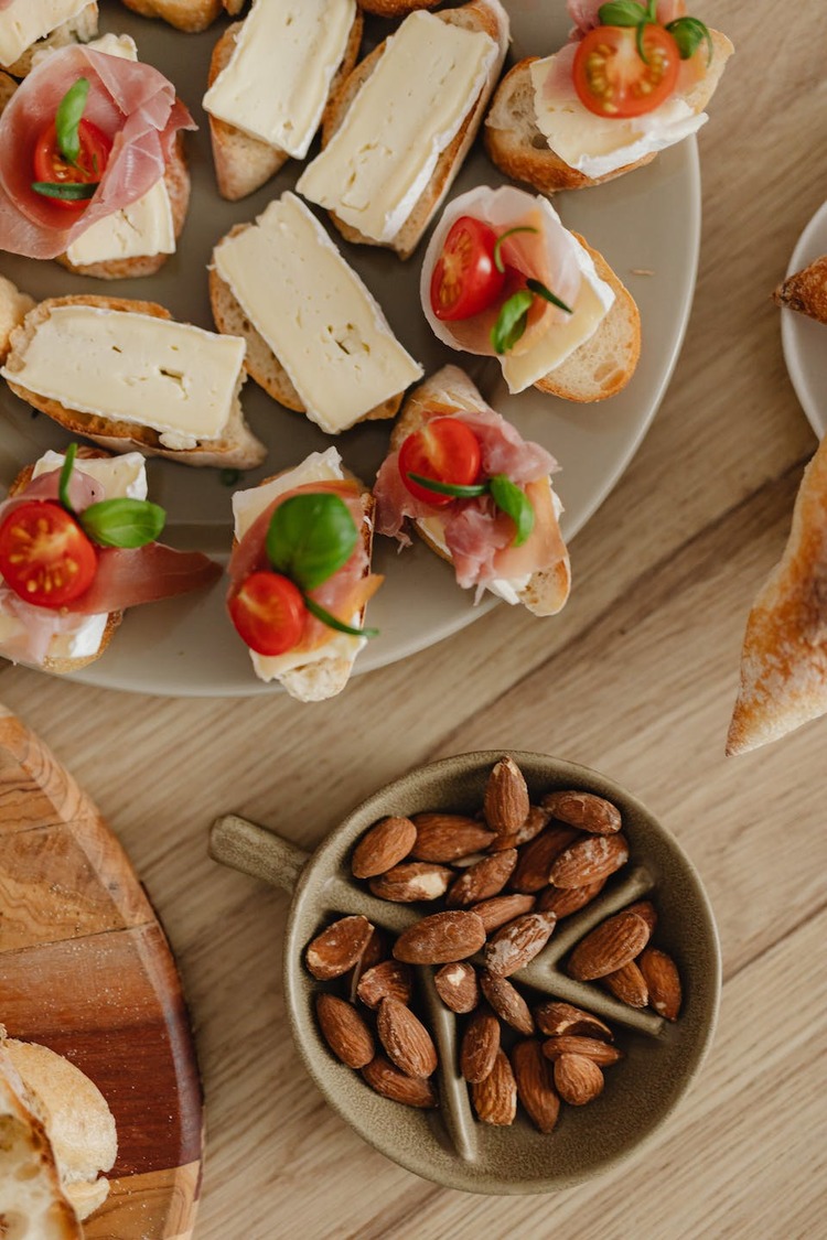 Roasted Almonds with Asiago Ciabatta, Deli Cuts and Brie Cheese Platter Recipe